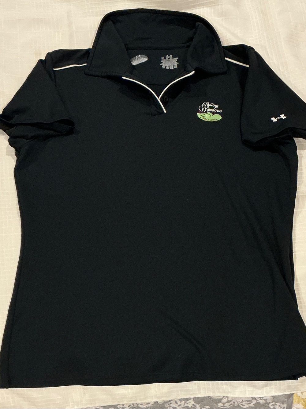 Under Armour Women’s Black Golf Polo Top with White Trim and Green Logo